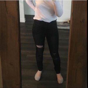 Black jeans with holes